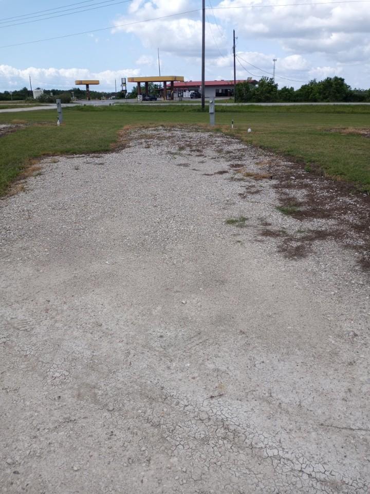 Front-row full hook-up RV sites with 30/50-amp electric pedestals and FM 2917 highway access at Double Time RV Park Alvin TX