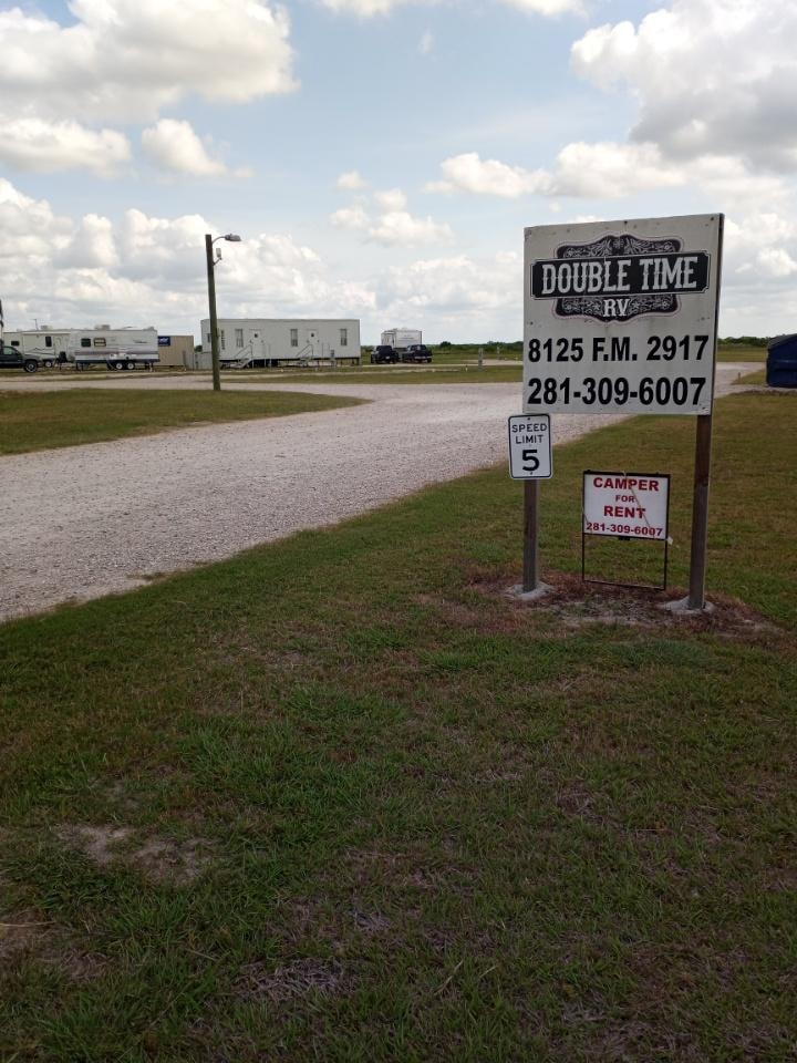 Double Time RV Park entrance sign at 8125 FM 2917 Alvin TX 77511 — monthly and long-term RV park near Houston petrochemical plants